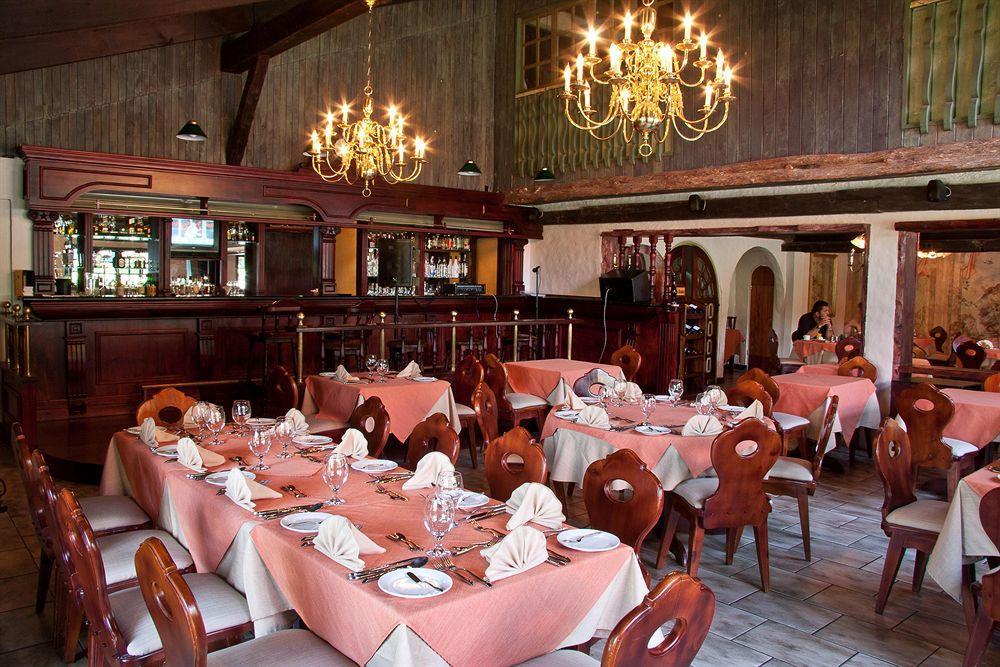 Hotel Chalet Tirol 에레디아 레스토랑 사진
